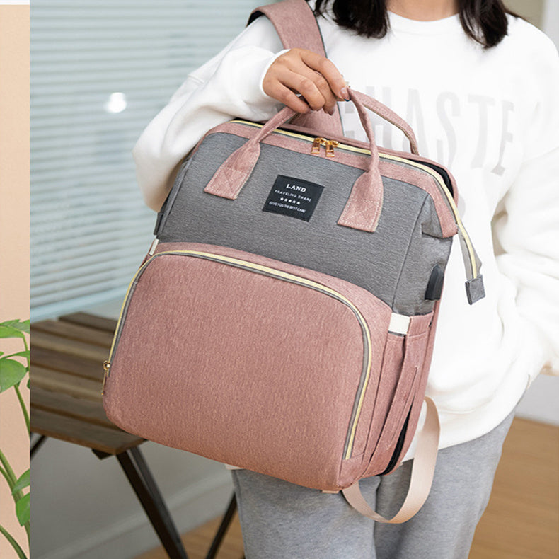 Sac à dos maman New Mummy – Lit de voyage intégré & compartiment isotherme