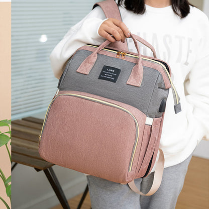 Sac à dos maman New Mummy – Lit de voyage intégré & compartiment isotherme